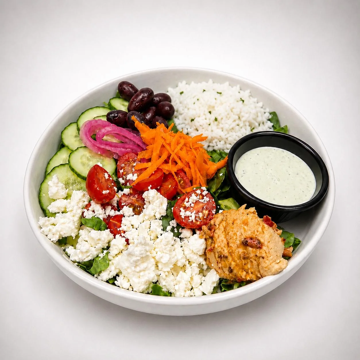 The Riviera Bowl with rice, feta, hummus and vegetables
