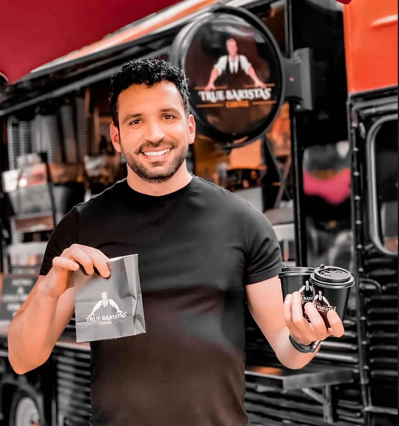 True Baristas team member at the vintage coffee truck