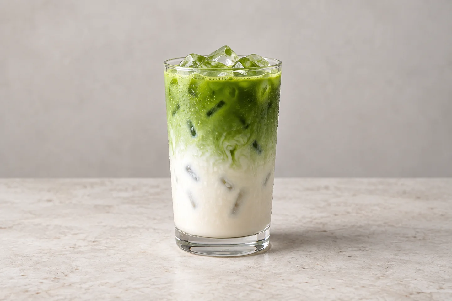 Illustrative iced matcha latte from the True Baristas menu